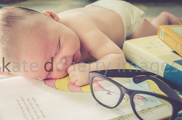 Indoor on-location reading at home newborn portrait